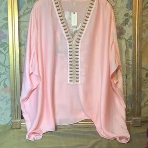Pink silk caftan with gorgeous trim and elaborate embroidery on the back